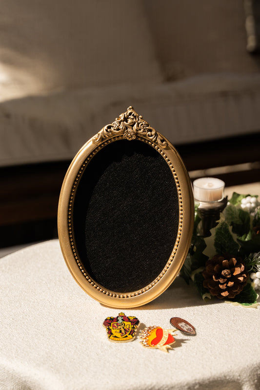 Pre-Order The Gilded Oval